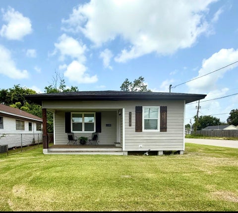 Photo of 1002 Block Street, Port Neches, TX 77651 (MLS # 65568078)