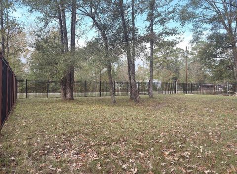 Photo of 256 County Road 2146, Cleveland, TX 77327 (MLS # 12679655)