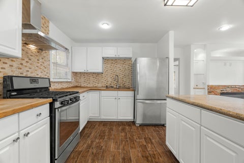 Photo of 729 E 41st Street, Houston, TX 77022 (MLS # 33606722)