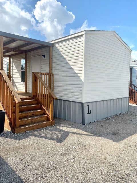 Photo of 3621 County Road 161 #L, Alvin, TX 77511 (MLS # 42079933)