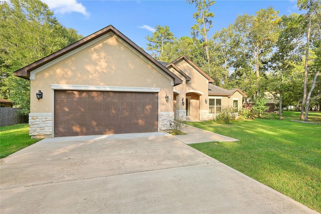 Photo of 642 Parthenon Place, New Caney, TX 77357 (MLS # 92123634)