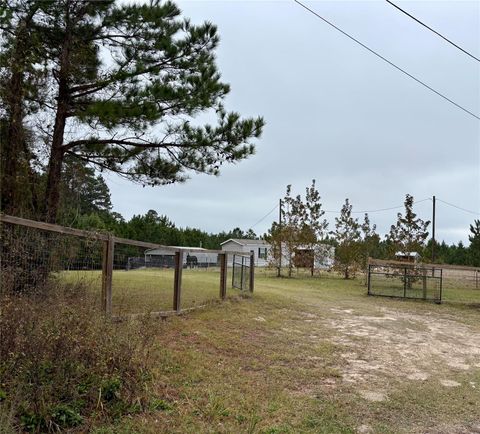 Photo of 707 Bill Rasbeary Road, Woodlake, TX 75865 (MLS # 73742630)