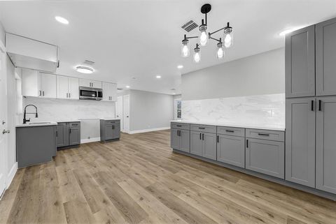 Photo of 7609 Saint Lo Road, Houston, TX 77033 (MLS # 94059155)