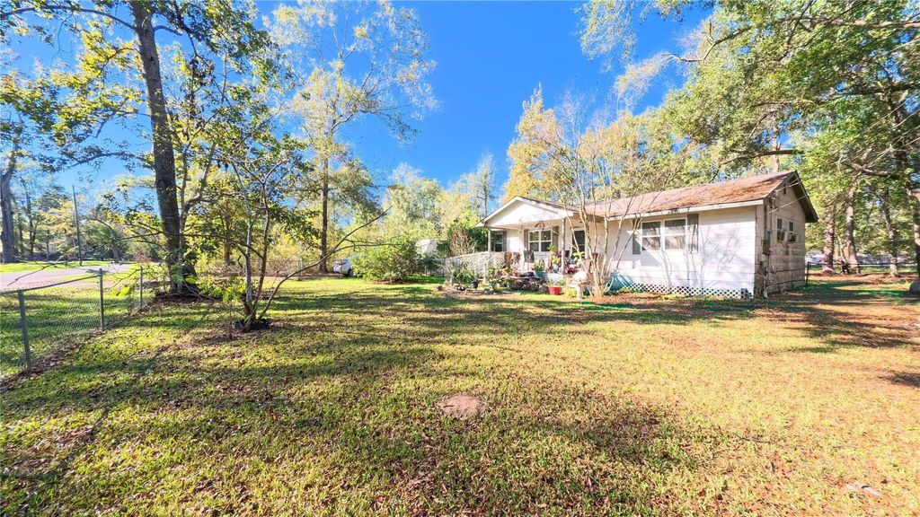 Photo of 26735 Saddle Rock Lane, New Caney, TX 77357 (MLS # 83417921)