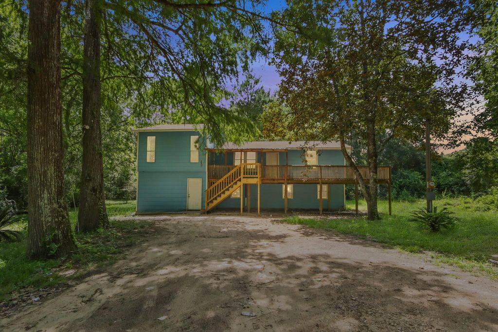 Photo of 21146 Caney Drive, New Caney, TX 77357 (MLS # 26452836)