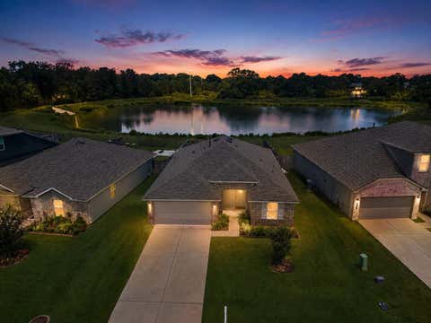 Photo of 12828 Water Dive Court, Willis, TX 77318 (MLS # 31114102)