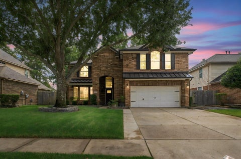 Photo of 14407 Baron Creek Lane, Houston, TX 77044 (MLS # 66835985)