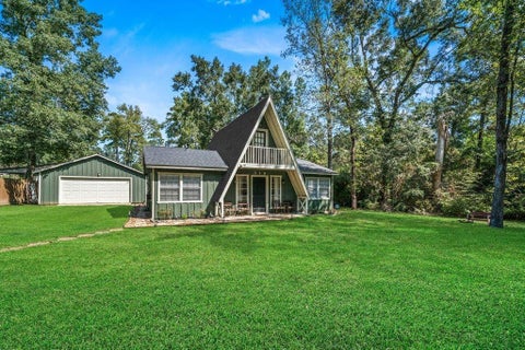 Photo of 819 Spokane River Road, Conroe, TX 77316 (MLS # 31602800)