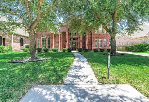 Photo of 14406 Brentshire Lane, Houston, TX 77069 (MLS # 98874781)