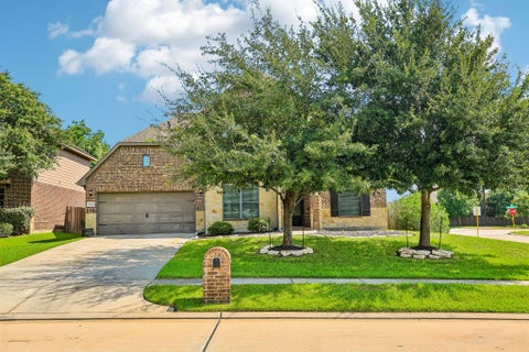 Photo of 20922 Warwickshire Drive, Tomball, TX 77375 (MLS # 54325882)