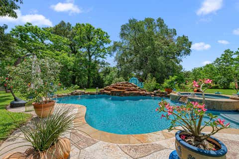 Photo of 203 Chipmunk Trail, Shepherd, TX 77371 (MLS # 65526649)