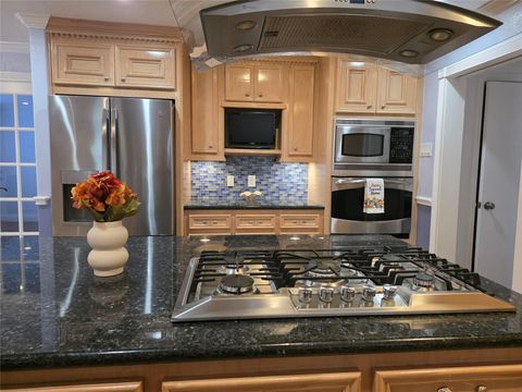 Photo of 1802 Oaks Drive, Pasadena, TX 77502 (MLS # 21560305)