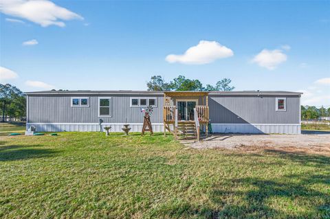 Photo of 12314 County Road 37495, Cleveland, TX 77327 (MLS # 44437778)