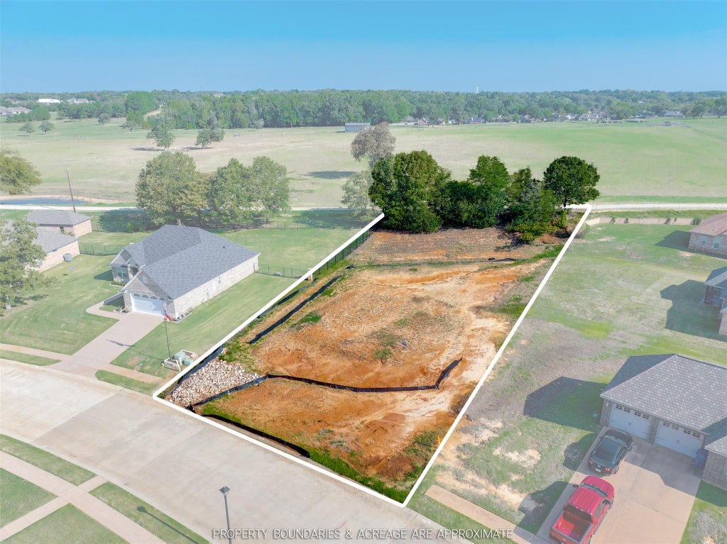 Photo of 409 Corrigan Trails Boulevard, Lindale, TX 75771 (MLS # 58574839)