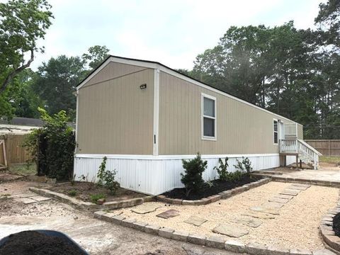 Photo of 630 Oak Valley Lane, Pinehurst, TX 77362 (MLS # 54216823)