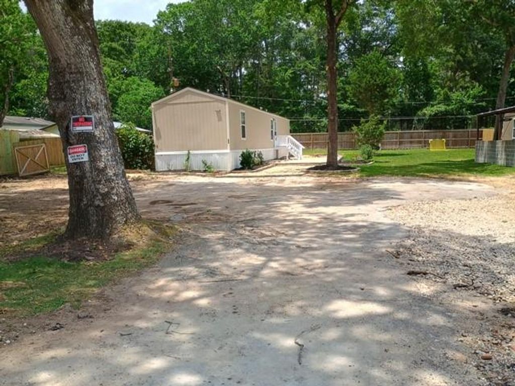 Photo of 630 Oak Valley Lane, Pinehurst, TX 77362 (MLS # 54216823)
