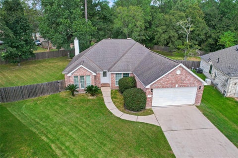Photo of 202 Maple Lane, Conroe, TX 77304 (MLS # 21944115)