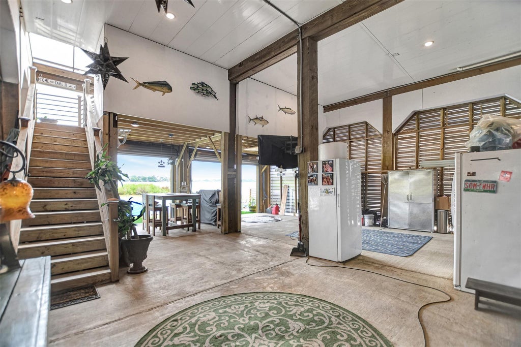 Photo of 25 Cmdr Runco Lane, Taylor Lake Village, TX 77586 (MLS # 23068230)