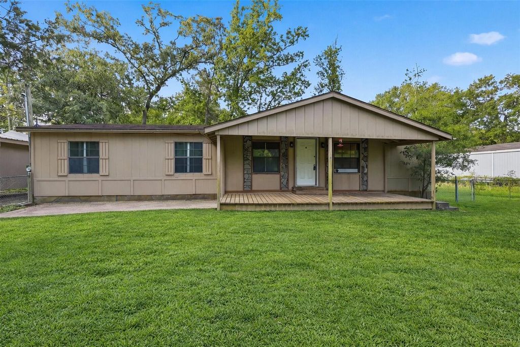 Photo of 23668 3rd Street, New Caney, TX 77357 (MLS # 68746379)