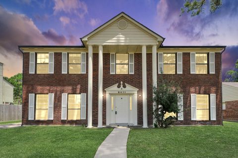 Photo of 8411 Sunny Ridge Drive, Houston, TX 77095 (MLS # 31548040)