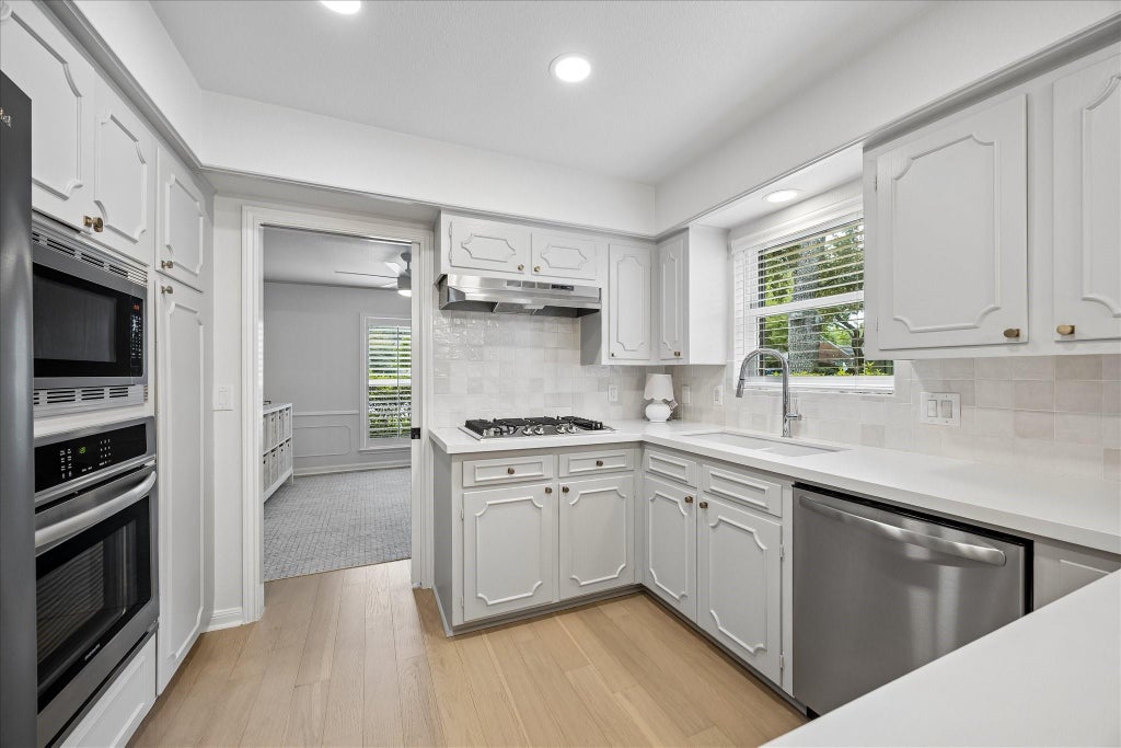 Photo of 10050 Wickersham Lane, Houston, TX 77042 (MLS # 94552224)