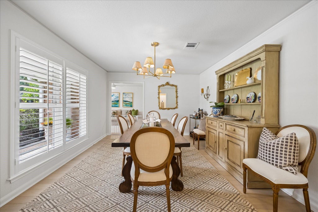 Photo of 10050 Wickersham Lane, Houston, TX 77042 (MLS # 94552224)
