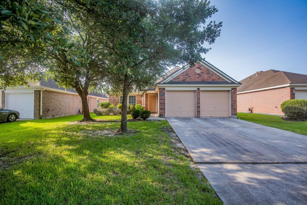 Photo of 26945 Kings Crescent Drive, Kingwood, TX 77339 (MLS # 26776686)
