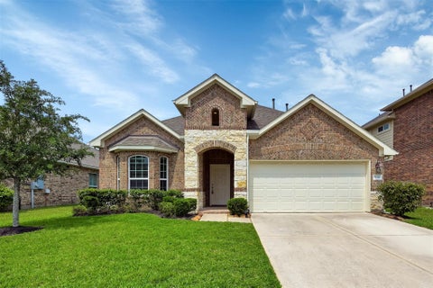 Photo of 21331 Somerset Shores Crossing, Kingwood, TX 77339 (MLS # 63215424)