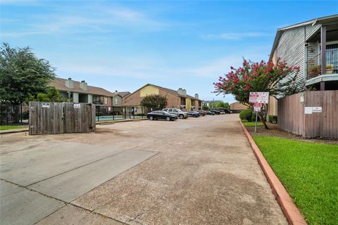 Photo of 9350 Country Creek Drive #18, Houston, TX 77036 (MLS # 32153108)