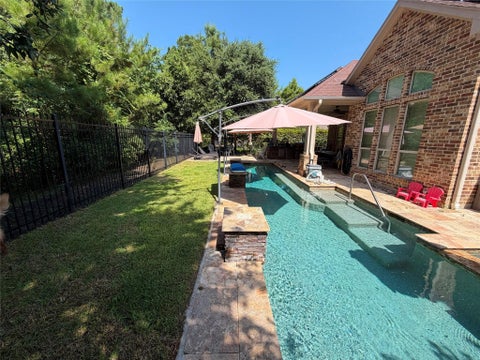 Photo of 31 Woodglade Way, Tomball, TX 77375 (MLS # 75413009)