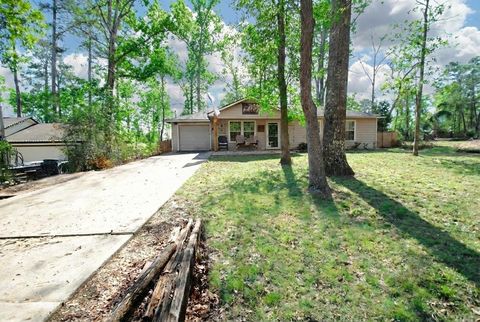 Photo of 10820 Royal Magnolia Drive, Conroe, TX 77303 (MLS # 83437000)