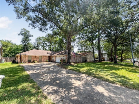Photo of 10330 Sweetwood Drive, Houston, TX 77070 (MLS # 93091861)