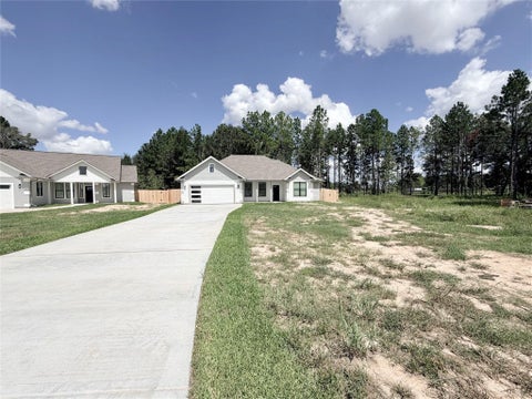 Photo of 1204 Road 5203, Cleveland, TX 77327 (MLS # 95970690)