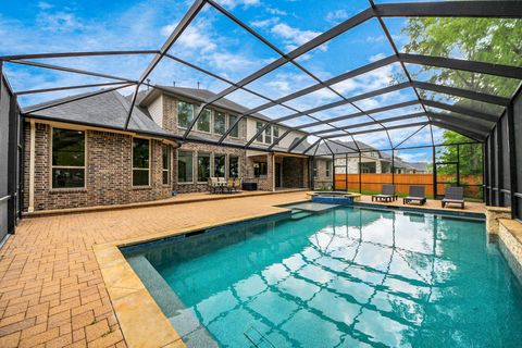 Photo of 10458 Lake Palmetto Drive, Conroe, TX 77385 (MLS # 21510822)