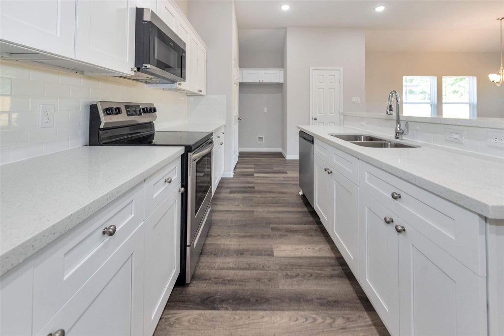 Photo of 245 County Road 5017, Cleveland, TX 77327 (MLS # 60639069)