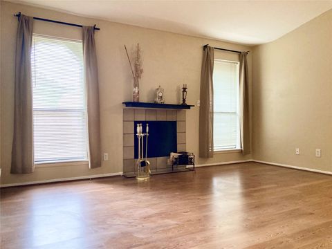Photo of 6602 Harbor Town Drive #1008, Houston, TX 77036 (MLS # 93166826)
