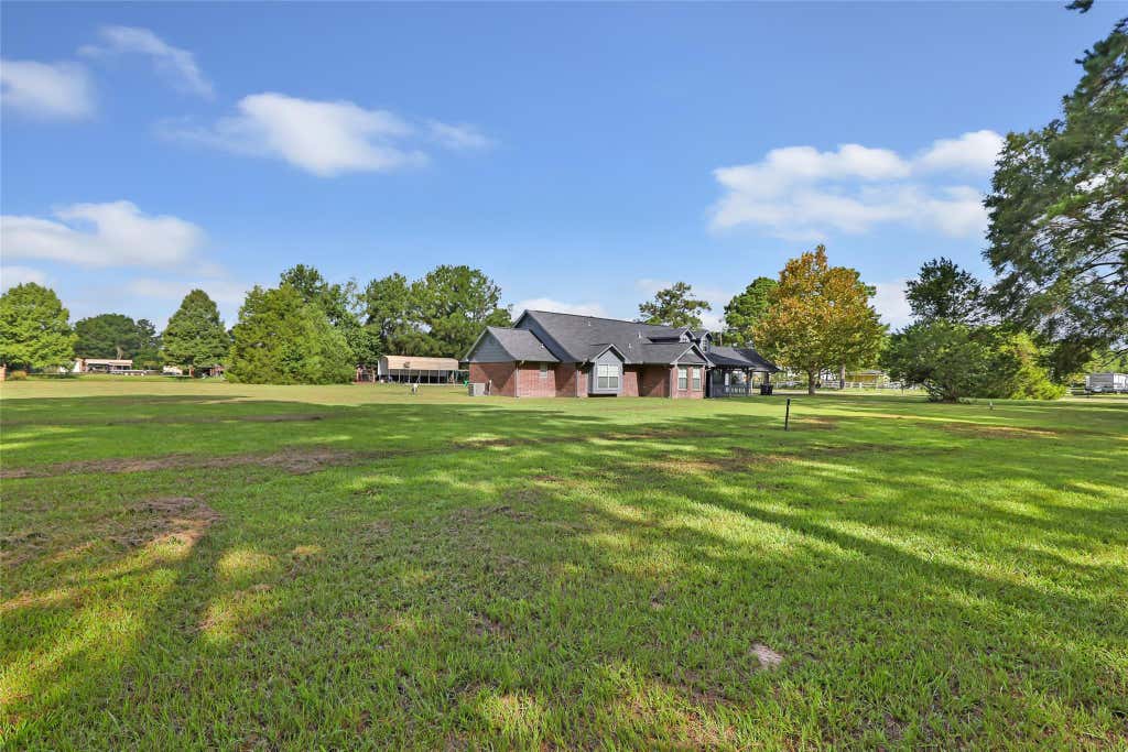 Photo of 1415 County Road 2291, Cleveland, TX 77327 (MLS # 46370941)