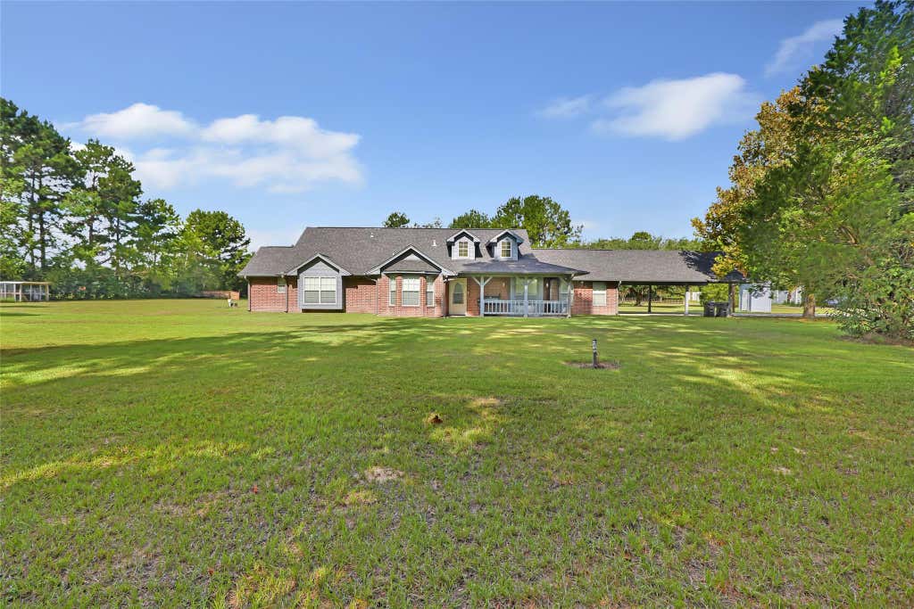 Photo of 1415 County Road 2291, Cleveland, TX 77327 (MLS # 46370941)