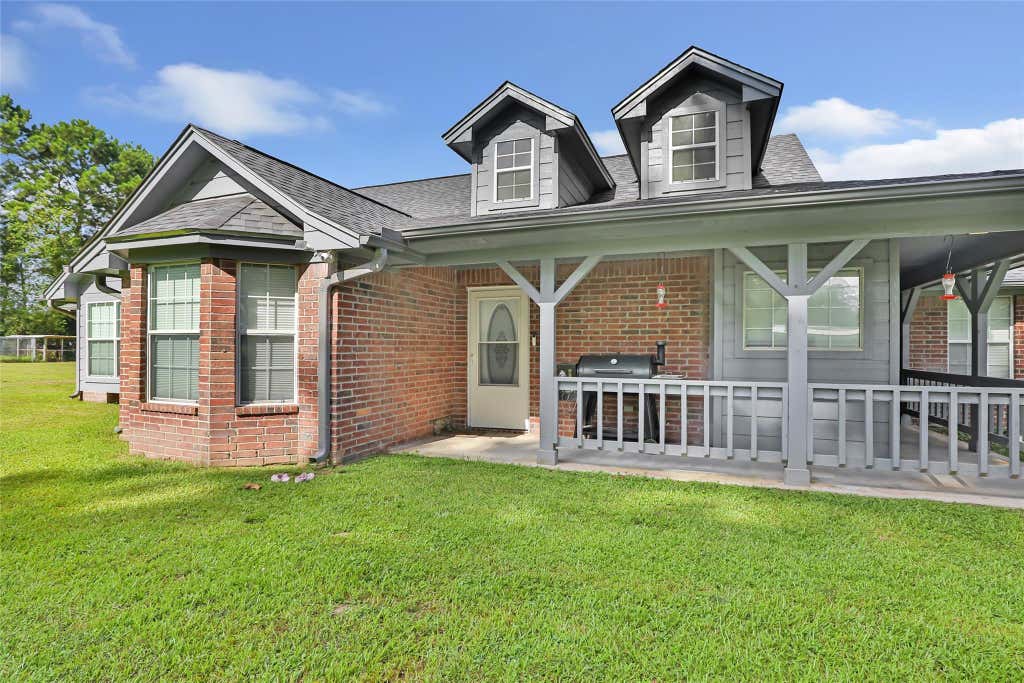 Photo of 1415 County Road 2291, Cleveland, TX 77327 (MLS # 46370941)