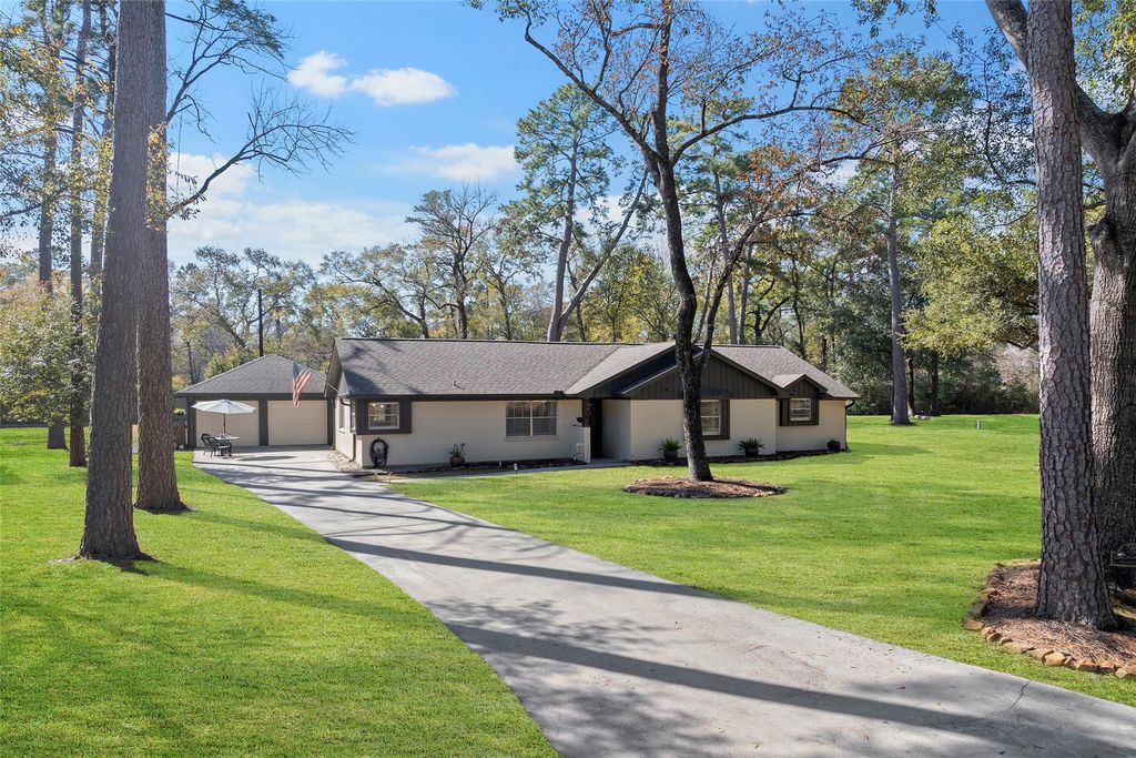 Photo of 26307 Hillside Drive, Oak Ridge, TX 77386 (MLS # 71991500)