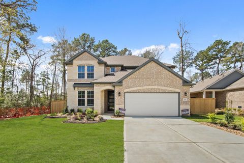 Photo of 209 Bronzewood Terrace Court, Conroe, TX 77318 (MLS # 87543231)