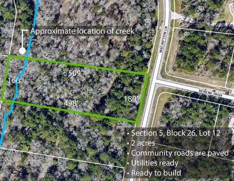 Photo of 5 Inscription Lane, Huntsville, TX 77340 (MLS # 34681144)