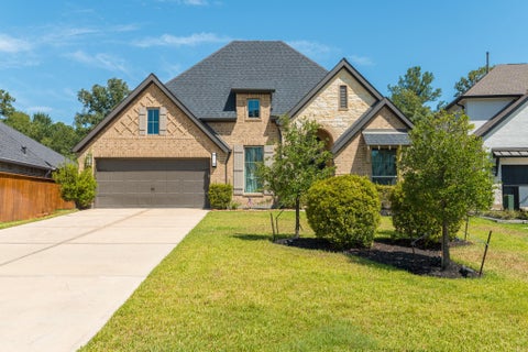 Photo of 413 Brackendale Court, Montgomery, TX 77316 (MLS # 72823243)
