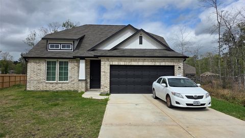 Photo of 1015 Thor, Roman Forest, TX 77357 (MLS # 55345845)