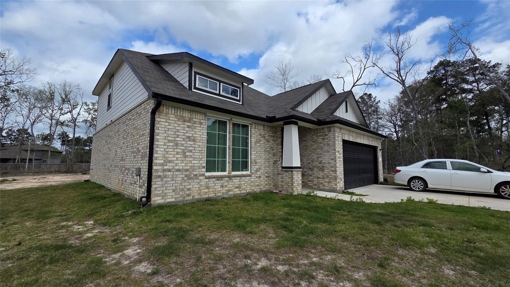 Photo of 1015 Thor, Roman Forest, TX 77357 (MLS # 55345845)