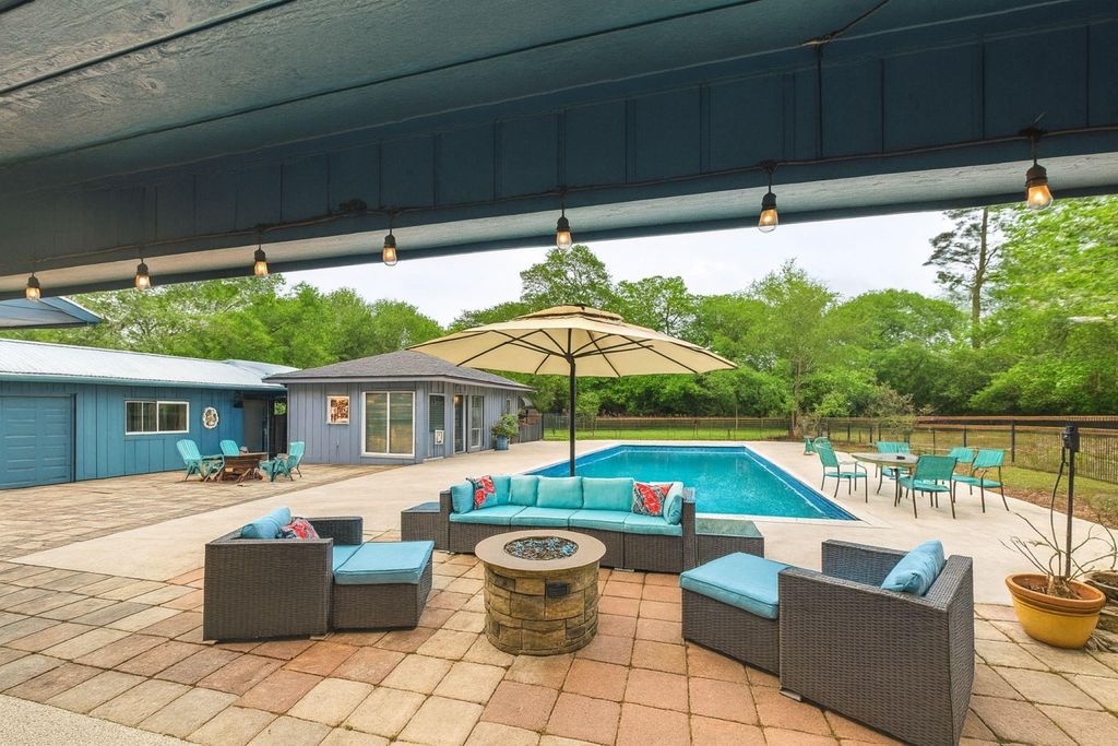 Photo of 1310 Golden Bear Lane, Kingwood, TX 77339 (MLS # 96038761)