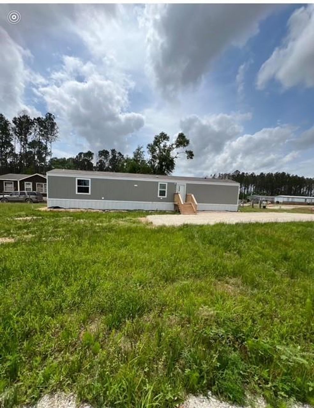 Photo of 614 Cr 5253, Cleveland, TX 77327 (MLS # 95719813)