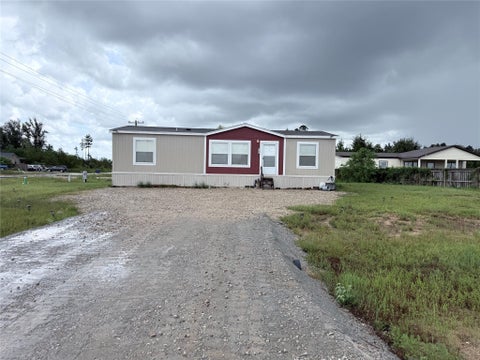 Photo of 261 Road 5609, Cleveland, TX 77327 (MLS # 90665299)