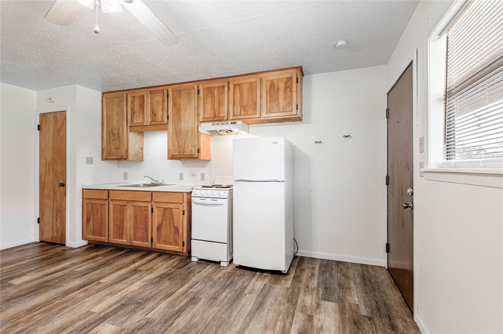 Photo of 120 Mcadams Lane #J, Huntsville, TX 77320 (MLS # 72920390)
