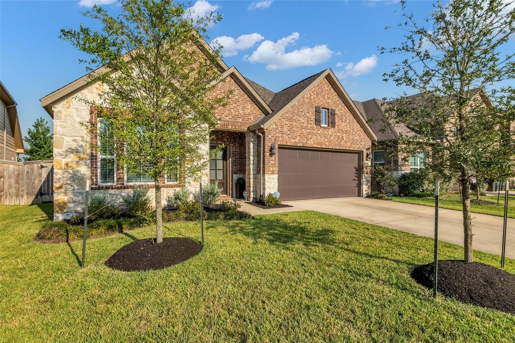 Photo of 1936 Canyon Live Oak Street, Conroe, TX 77304 (MLS # 94009792)